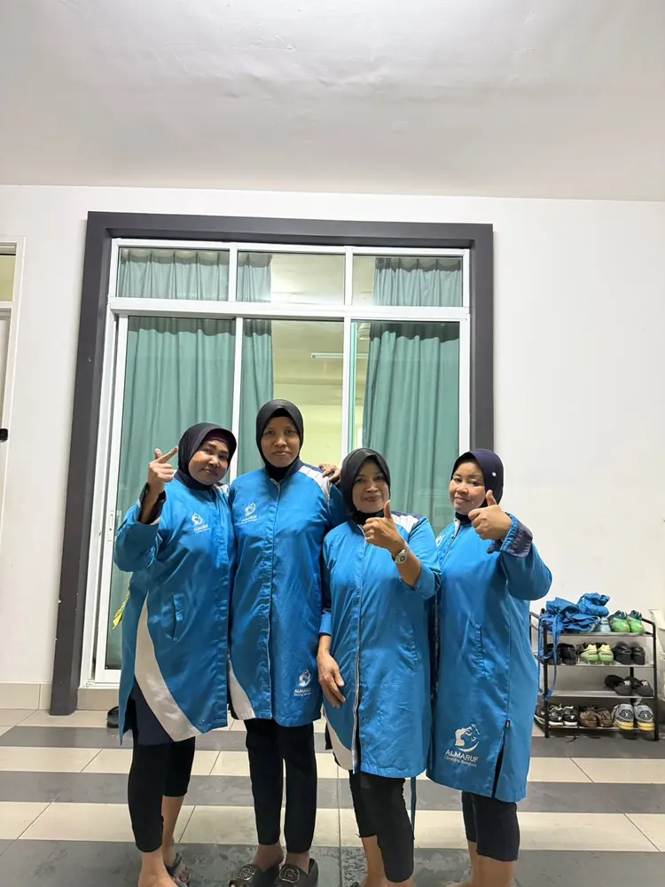 Four Almaruf Clean cleaners in uniform